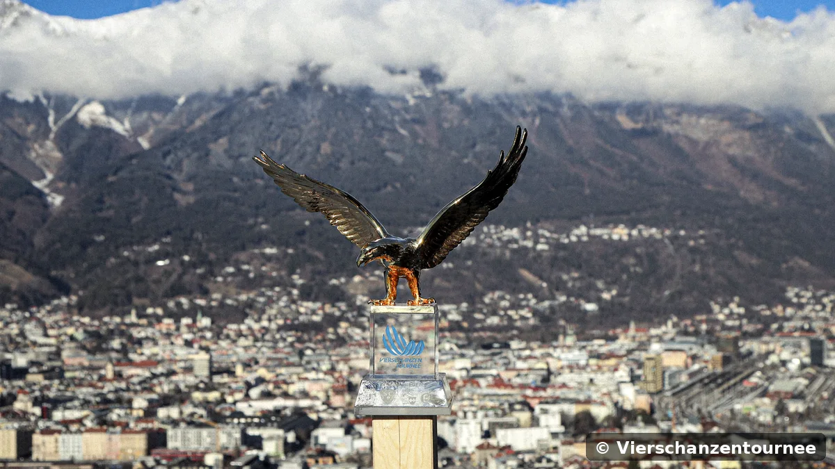 Plakat 75. novoletne turneje štirih skakalnic z orlom nad Innsbruckom